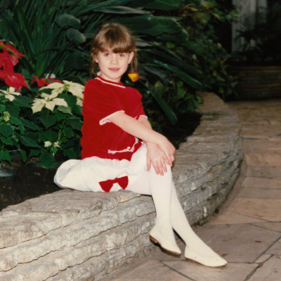 Childhood picture of Alice Wetterlund in cute red dress